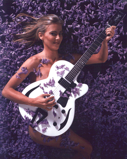 Nikki with a RainSong Guitar